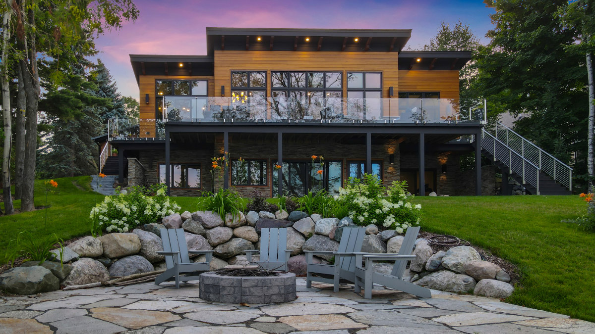 Torch Lake Modern Rear with rustic patio and firepit